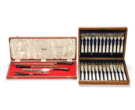 A Harrods of London carving set, cased, together with a canteen of twelve mother of pearl handled fish knives and forks - The