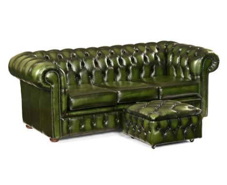 A Victorian style green leather deep buttoned Chesterfield settee, with pouffe to match.