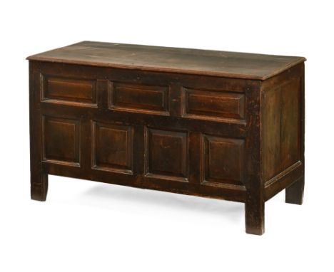An 18th century oak coffer, with hinged rectangular top and fielded panel design on square feet.  136 cm wide, 79 cm high, 60