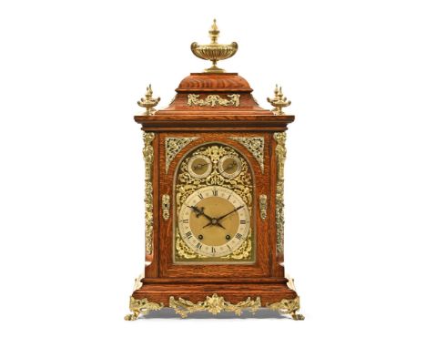 An Edwardian oak bracket clock, with spring driven two train movement with chime and silent to arch and advance and retard me