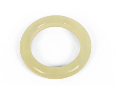 A rare Chinese jade child's bangle, internal diameter 37 mm.