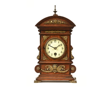 An early 20th century mantle clock, with brass mounts, with single train, Lenzkirch one million movement.  Height 30 cm. COND