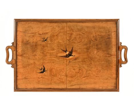 A walnut tray with folding handles, raised rectangular edge with inset chessboard.  78 cm wide, 54.5 cm deep. (see illustrati