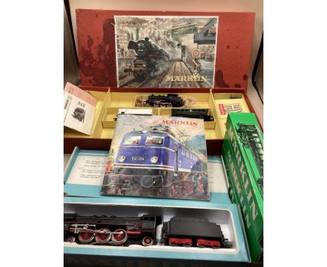A Märklin HO steam locomotive train set, model Railway interest vintage boxed pieces boxed; a Marklin Schnellzuglokomotive 30