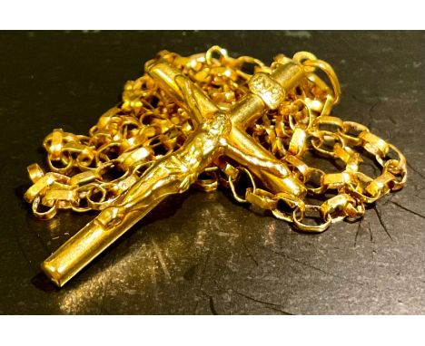 A 9ct gold crucifix pendant with fine 9ct gold belcher chain, the pendant is indistinctly stamped, measuring approx. 4.2cm (H