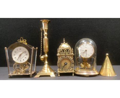 A German brass Schatz mantel clock, glass case, 17cm; a brass anniversary clock by Kein, glass dome, 17cm; a brass candlestic