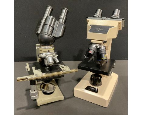 A Swift M3200 elecron binocular microscope, three rotating lenses, cream stand;  another Russian OMO, P6Y42, AY-12, 1.5x, No 