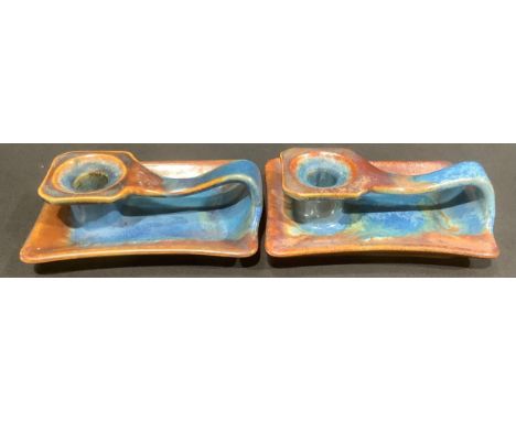 A pair or Bourne Denby Danesby Ware chambersticks, 15cm long (2)