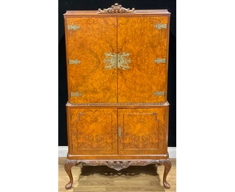 A ‘Queen Anne’ style walnut veneer cocktail or drinks cabinet, 160.5cm high, 94cm wide, 47.5cm deep
