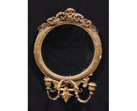 A Victorian giltwood and gesso girandole looking glass, acanthus cresting over circular mirror plate, the shaped apron with t