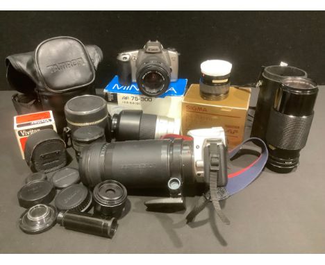 Photography - a Canon EOS 300 camera with Tamron AF LD 200mm- 400mm telephoto macro zoom lens, serial number 607969, with len