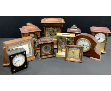 A 20th century faux-walnut mantel clock, arch-top dial inscribed TEMPUS FUGIT, enamel chapter ring, Roman numerals, 33cm high