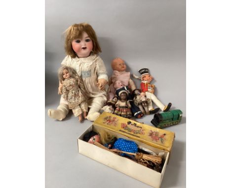 A German Bisque head doll( with hairline across Forehead together with her own same age small doll; further vintage dolls ,a 