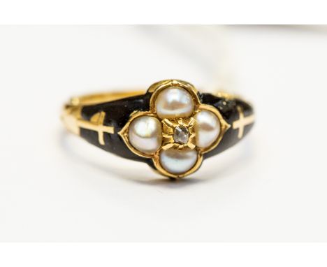 A Georgian mourning ring, set with four pearls in a cross shape, set to the centre with a diamond, black enamel shoulders inl