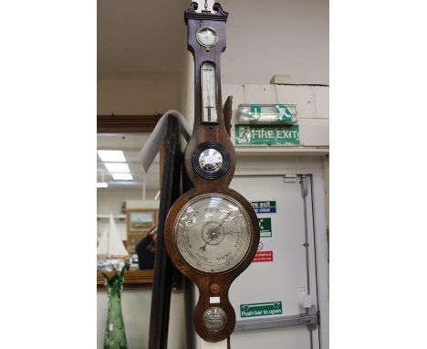 A 19th Century mahogany banjo barometer, swan neck pediment