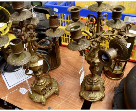Pair of brass candelabra with four branch and centre candlestick with intricate detail, approx 14" high