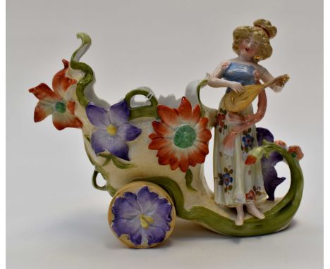 A German mantle Cornucopia vase circa 1920's with woman playing lute