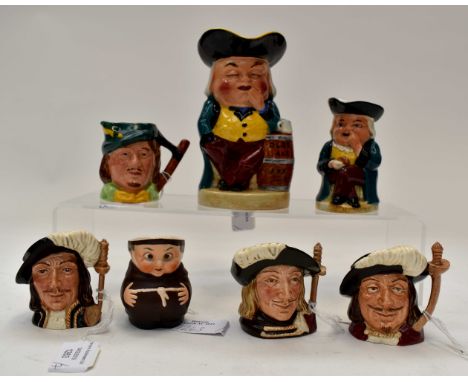 Character jugs, three Royal Doulton small "Three Musketeers"; a Goebel monk jug; Robin Hood and two Toby jugs (7)