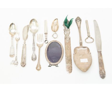 A quantity of early 20th Century American silver including letter opener, cake slice, leaf shaped caddy spoon, two corkscrews