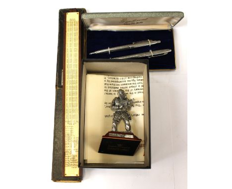 An English miniature pewter figure of "SAS Who Dares Wins" together with 1960's Canadian boxed pens, "The Diplomat by North -