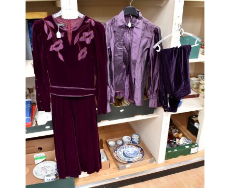 A deep burgundy Louis Feraud velvet dress with silk and beadwork flower motifs on the the upper bodice and a wide belt edged 