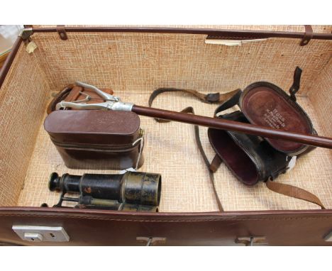 A Swaine and Deney Ltd (Piccadilly London) shooting stick; a pair of cased military issue 203 binoculars (possibly Marines) V