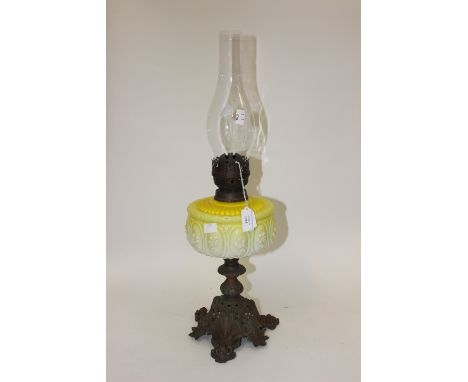 19th Century lamp with cast iron base and yellow glass decoration A/F