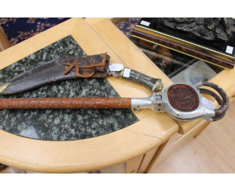 Kukri gerka knife and sheath together with an Indian carved mid Century Shooting stick (2)