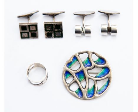 Two pairs of George Jensen sterling silver cuff links, one pair set with green enamel detail along with a silver blue and gre