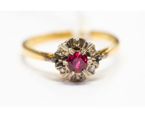 A spinel and diamond cluster ring,  18ct gold mount, size N, total gross weight approx 3.3gms