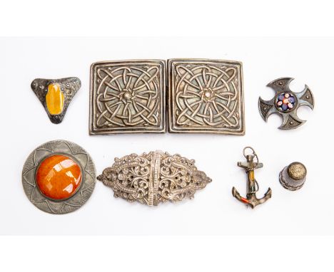 A collection of silver and white metal jewellery including silver nurses belt buckles 1903, Birmingham, hard stone set anchor