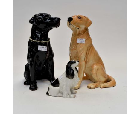 Collection of ceramic dogs, two large labs and a spaniel