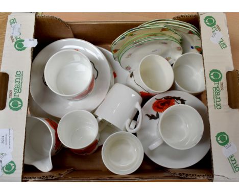 A Wedgwood Susie Cooper design tea set comprising six cups, six saucers and six side plates, cake plate, milk jug, sugar bowl