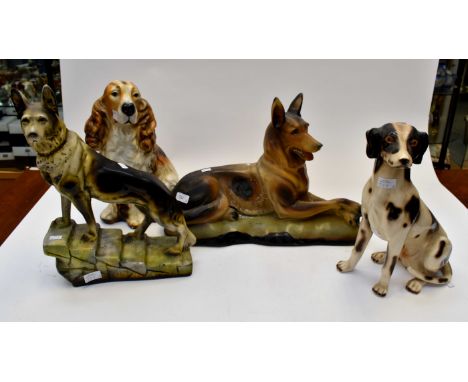 Two large resin figures of Alsatians, a ceramic Pointer and a polychrome Spaniel (4)