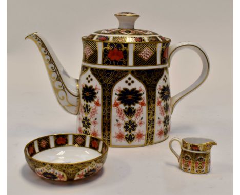 Royal Crown Derby 1128 Imari pattern teapot together with a miniature cream jug and small sugar basin (3)Condition: Good, no 