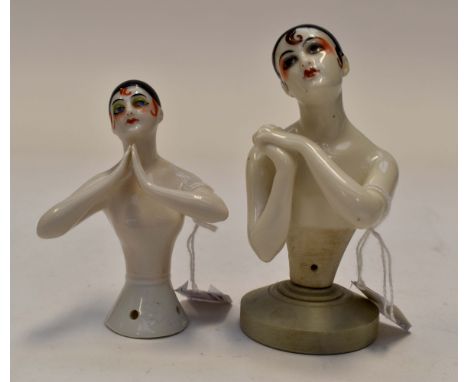 A Pair of art deco 'pierrot' half-doll pin cushions, one on a supporting stand (2).Condition:No obvious issues or defectsHeig