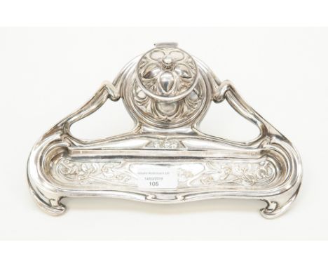 An electro plated silver art nouveau style inkwell, with floral design, circa 1900.Missing ink liner.