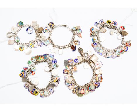 Five silver charm bracelets with enamel
