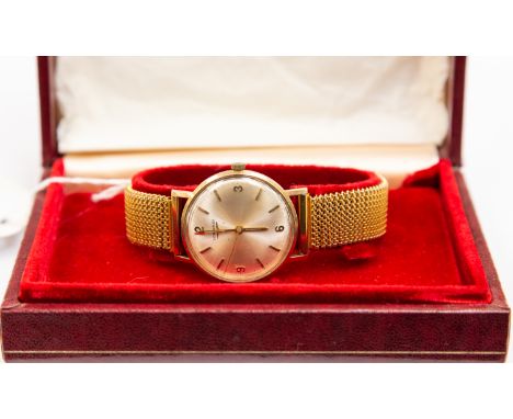 A 1960s 9ct gold, hallmarked, gents Longines manual wristwatch, champagne dial, batons and numbers,  with valuation certifica