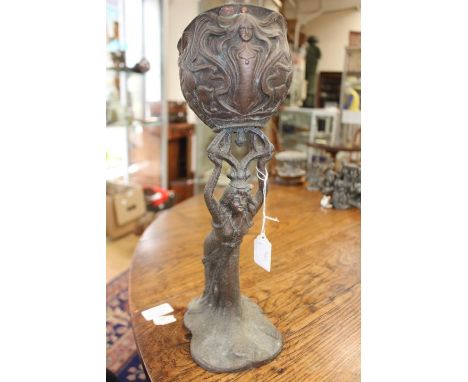 An Art Nouveau spelter figural table planter, in the form of a Lady carrying an urn A/F