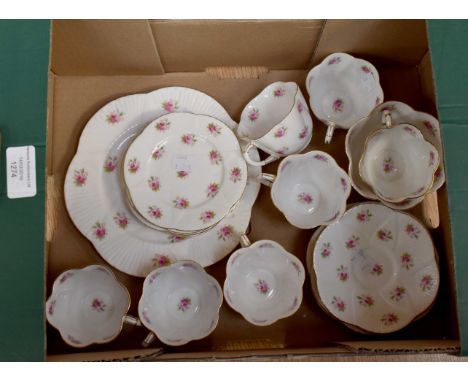 Part Shelley // Foley tea set in Rose Bud pattern, comprising six Shelley cups, one damaged cup, Shelley sugar bowl, six Fole