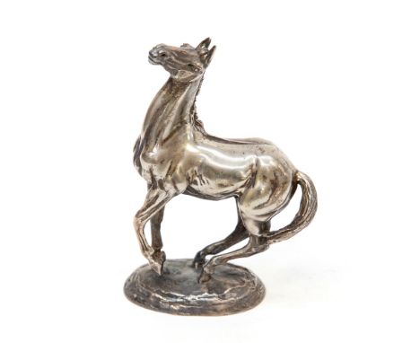 A silver horse sculpture boxed by John Pinder 1975, "Playing Up"