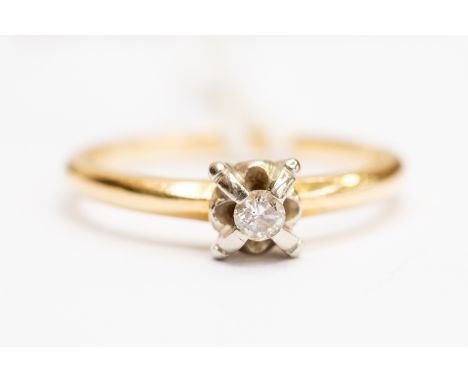 A diamond solitaire, the claw set diamond approx approx 0.10ct,  18ct gold mount, size O, total gross weight approx 3.3gms