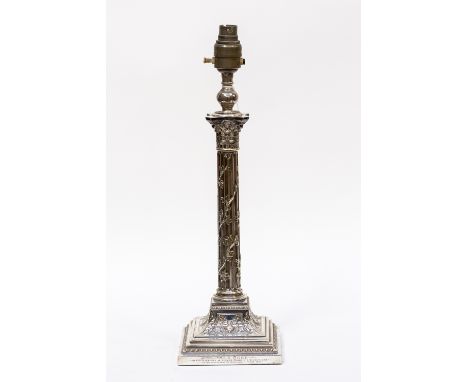 A George V silver plated lamp base cast as a Corinthian column with vine detail, the foot engraved with presentation inscript