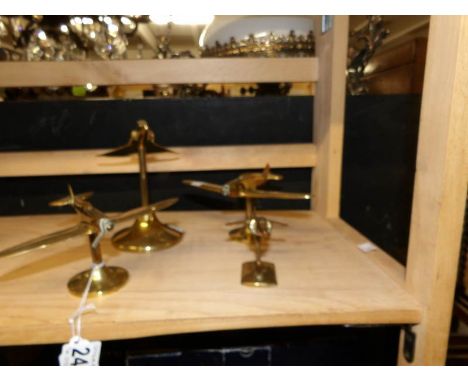 4 brass model air planes.