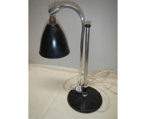 A vintage angle poise lamp.