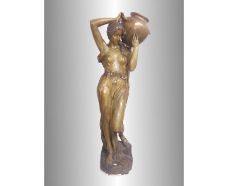 A Goldscheider water carrier statue.