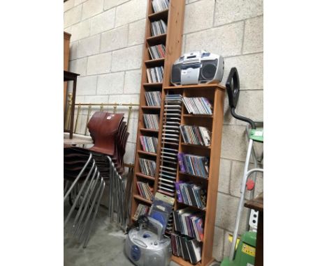 2 CD racks, a large quantity of CD's, A Matsui stereo cassette recorder and a Tamashi compact disc player