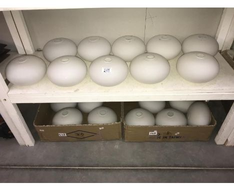 17 white lamp shades (2 shelves)