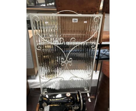 A glass fire screen